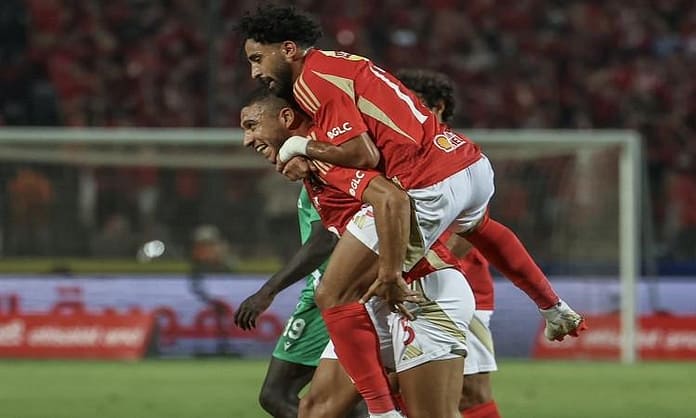 “Al Ahly Secures a Dominant 3-0 Victory Over Gor Mahia in the African Champions League” “Al Ahly players celebrating a 3-0 win against Gor Mahia in the African Champions League.”